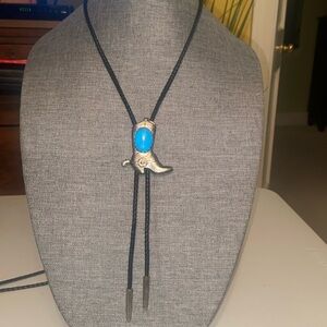 Vintage Silver Western Boot with Turquoise Stone on a Black Leather Bolo Tie